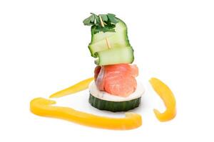 Canapes without Bread with Fresh Salmon, Cucumber and Cream Cheese - Isolated on White Background. Easy Breakfast. Diet Food. Quick and Healthy Sandwiches. Healthy Snacks with Tasty Fillings photo