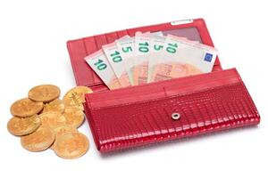 Opened Red Women Purse with 10 Euro Banknotes Inside and Bitcoin Coins - Isolated on White Background. A Wallet Full of Money Symbolizing Wealth, Success, Shopping and Social Status - Isolation photo