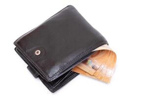 Black Leather Men Wallet with Fifty Euro Banknotes Inside - Isolated on White Background. A Purse Full of Money Symbolizing Wealth, Success and Social Status - Isolation photo
