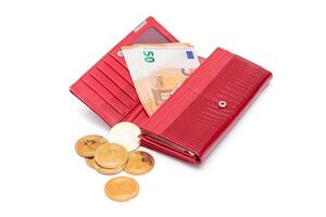 Opened Red Women Purse with 50 Euro Banknotes Inside and Bitcoin Coins - Isolated on White Background. A Wallet Full of Money Symbolizing Wealth, Success, Shopping and Social Status - Isolation photo