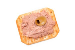 Crispy Salted Cracker with Liver Pate and Olives - Isolated on White. Easy Snack - Isolation photo