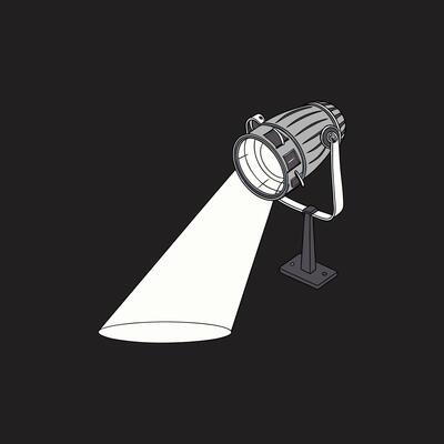 A spotlight is shown on a black background