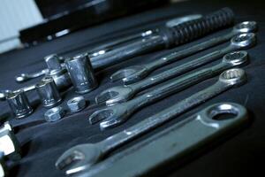 Metal Engineering Hand Tools On Angle Shelf In Workshop photo