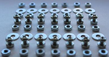 Variety Fixing Hardware Laid Out In Straight Lines Angle View Closeup Stock Image photo