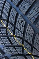 Snowflake Shaped Tyre Wear Indicator On New Winter Tyre. Tire Condition Explaining. Tire Information For Driver Safety photo