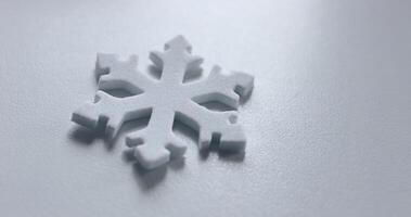 Winter Is Coming. Snowflake Isolated On Cold White Surface Angle View. Decorative Snowflake On White Copy Space Stock Photo