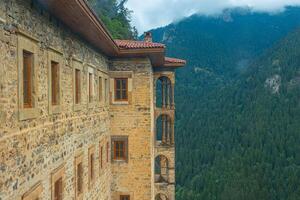 Exterior view of Sumela Monastery with landscape of the forest photo