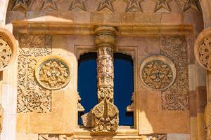 Carved stone decorations of the gate of Great mosque and hospital of Divrigi photo