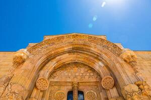 Carved stone decorations of the gate of Great Mosque of Divrigi photo