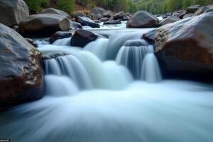A river flowing through rocks in the forest photo