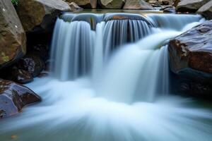 Waterfall in the mountains photo