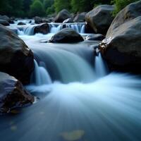 A river flowing over rocks in the forest photo