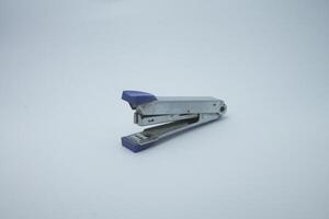 paper stapler isolated on white background photo