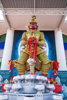 Thao Wessuwan Statue.Thai Guardian of Wealth and Spirits in a Sacred Temple at Ayutthaya, Thailand. photo