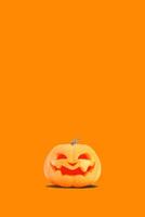 Jack o lantern isolated on orange vertical background for halloween concept, 3d rendering illustration. photo