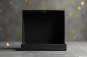 Elegant empty black gift box with bokeh background lighting photo