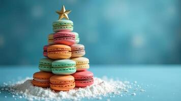 Festive macaron tree with star topper on powdered sugar base photo