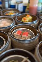 Mix dim sum chinese food in bamboo basket photo