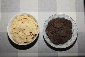 Containers with cocoa butter and grated cocoa, top view, texture. Basic ingredients for making chocolate at home. Close-up of chopped food, top view. photo