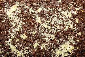 Cocoa butter and cocoa mass, top view, texture. Basic ingredients for making chocolate at home. Close-up of chopped food, top view. photo