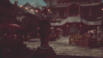 Dusk in a tranquil Japanese garden with a lantern and architecture video