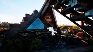 Stunning modern architecture featuring sharp angles at sunset near a river video