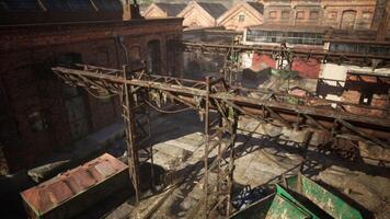 Abandoned factory with collapsing brick buildings and rusted structures video
