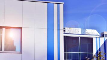 Abstract modern business architecture. Office building with aluminum composite panels. Facade wall made of glass and metal. photo