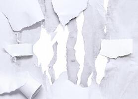 High-resolution white paper texture with torn edges, perfect for grunge and distressed backgrounds. photo