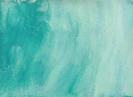 Turquoise watercolor texture background with a soft abstract pattern, perfect for design, art, or creative projects. photo