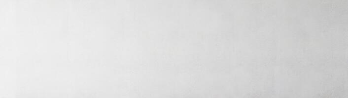 Smooth light gray wall texture with subtle gradient, ideal for background or design elements. photo