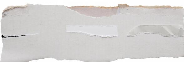 Torn piece of white paper with rough edges, isolated on a white background, ideal for design elements and creative projects. photo
