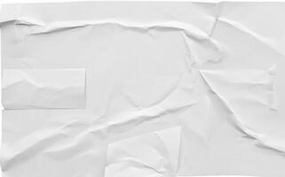 Crumpled white sheet of paper with folds and creases, isolated on a white background, ideal for design or texture use. photo