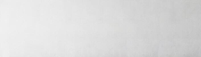 Smooth light gray wall texture with subtle gradient, ideal for background or design elements. photo