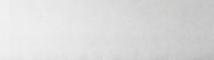Smooth light gray wall texture with subtle gradient, ideal for background or design elements. photo