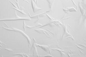 Abstract white paper texture with crumples and wrinkles, perfect for backgrounds or design elements. photo