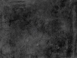 Dark grunge textured background with rough surface and abstract patterns, perfect for design, grunge themes, and backdrops. photo