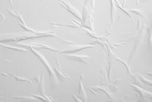 Abstract white paper texture with crumples and wrinkles, perfect for backgrounds or design elements. photo