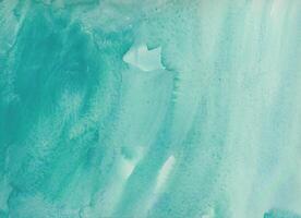 Turquoise watercolor texture background with a soft abstract pattern, perfect for design, art, or creative projects. photo