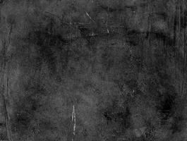 Dark grunge textured background with rough surface and abstract patterns, perfect for design, grunge themes, and backdrops. photo