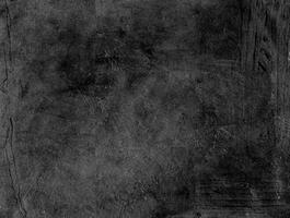 Dark grunge textured background with rough surface and abstract patterns, perfect for design, grunge themes, and backdrops. photo