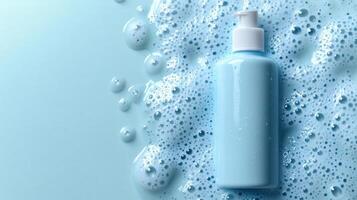 A tranquil blue lotion bottle rests atop a clear surface dotted with delicate bubbles photo