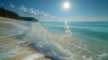 Clear turquoise waters lap the shore while sunlight sparkles on the gentle waves photo