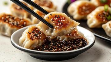 Delight in crispy dumplings paired with flavorful dipping sauce photo