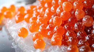 Fresh salmon roe is delicately arranged on ice, highlighting its vibrant hue photo