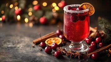 A sparkling beverage with cranberries and dried oranges invites festive cheer photo