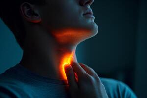 A man is currently suffering from neck pain along with swollen glands, which are common indicators of various health issues, including potential cancer symptoms that may require further evaluation photo