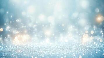 A mesmerizing light blue background that showcases numerous shimmering dots and sparkling effects, all combining to create a magical winter ambiance enhanced by an enchanting bokeh pattern photo