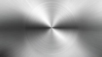 A polished metallic silver background with a brushed texture, ideal for industrial designs and presentations. Its reflective gray tones enhance visual appeal and add a modern touch photo