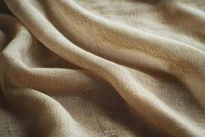 The soft beige fabric creates elegant folds, making it ideal for textile design and home decor projects photo